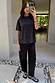 Black Studded T-Shirt in relaxed cotton with silver neckline studs, styled with matching trousers in a mirror selfie.
