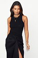 Black Ribbed Tank in soft stretch fabric, a versatile wardrobe staple styled with a black wrap skirt.