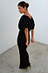 Black Tilly Dress with gold foil flecks in textured plisse fabric, featuring an off-shoulder neckline.