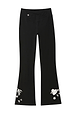 Black wide leg cotton joggers featuring ecru embroidered motifs and a crossover waistband.