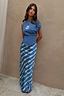 Blue Marina Dorris Skirt with a white fish print on blue satin, worn by a 5ft4” model in UK size 8.