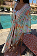 Blue Dreamer Maxi Kimono with iconic palm and sun motifs, styled as a flowy poolside vacation cover-up with a tie waist.