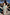 Thumbnail for Blue Dreamer Maxi Kimono in light blue with palm and sun motifs, worn by a 5ft7 model in size M by a pool.