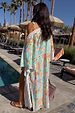 Blue Dreamer Maxi Kimono in light blue with palm and sun motifs, worn by a 5ft7 model in size M by a pool.