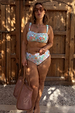 Blue Dreamer high waist bikini briefs with sun and palm motifs, styled for inclusive curve vacation fashion.