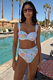Blue Dreamer High Waist Brief featuring a bold sun and palm abstract print, worn by a model poolside.