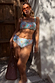 Blue Dreamer High Waist Brief in a sun and palm print, shown on a UK 18 model for inclusive sizing.