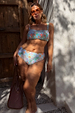 Blue Dreamer High Waist Brief in a sun and palm print, shown on a UK 18 model for inclusive sizing.