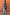 Thumbnail for Blue Eye Cardigan featuring knitted eye motifs, styled with light wash denim jeans and sunglasses.