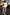 Thumbnail for Blue Cotton Stripe Jogger with red pinstripes, paired with a white button-up cardigan for a London street style look.