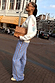 Blue Cotton Stripe Jogger with red pinstripes, styled with a cream embroidered sweater and leopard print clutch.
