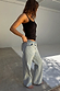 Blue Scallop Detail Straight Leg Jeans in structured denim styled with a black vest top.