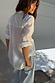 Blue Scallop Detail Straight Leg Jeans styled with a white shirt, showcasing the unique scalloped back pockets.