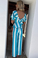 Blue Stripe Kiki Top featuring a tie-back bow and puffed sleeves, styled with matching striped trousers.