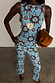 Blue Sun Foldover Trousers and matching vest jersey co-ord featuring hand-painted sun motifs.
