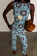 Blue Sun Foldover Trousers and matching vest jersey co-ord featuring hand-painted sun motifs.