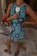 Blue Sun Tank Top in soft-touch jersey with hand-painted sun motifs, styled in a Mediterranean-inspired co-ord.
