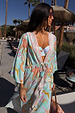 Blue Dreamer Underwired Bikini Top with a pastel celestial print, layered with a matching kimono in a resort setting.