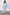 Thumbnail for Ice Blue Plisse Tilly Dress with silver metallic flecks and a voluminous off-the-shoulder top.