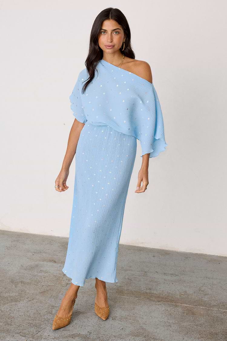 Ice Blue Plisse Tilly Dress with silver metallic flecks and a voluminous off-the-shoulder top.