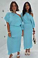 Turquoise Tilly Dress in blue plisse with gold flecks, shown on two models for inclusive sizing.