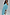 Thumbnail for Turquoise Tilly Dress in light blue plisse with gold flecks, styled off-the-shoulder for a multi-wear look.