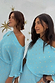 Turquoise Tilly Dress in light blue plisse with gold flecks, worn off-the-shoulder on two models.