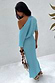 Turquoise Tilly Dress in light blue plisse with gold flecks, styled off-the-shoulder with a lettuce hem.