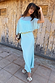 Blue Chiffon Tilly Dress with an off-the-shoulder chiffon top and satin skirt in a two-toned blue colourway.