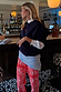 Navy Book The Flight Jumper featuring red embroidery, styled with paisley trousers and a white collared shirt.