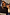 Thumbnail for Navy Book The Flight Jumper with red text, layered over a white collared shirt in a mirror selfie.