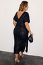 Thumbnail for Black Sequin Bow Dress with a V-back and velvet tie detail, showcasing inclusive sizing in a midi length.