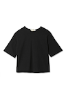 Black cotton t-shirt with a relaxed silhouette, dropped shoulders and cream ribbon bow detailing on the back.