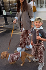 Chocolate Bandana Knitted Set on a child and adult with a matching dog on a London street.
