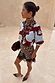 Thumbnail for Burgundy & Blue Poppy Cardigan with leopard print trim, styled with a leopard skirt and lace hem.