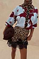 Thumbnail for Burgundy & Blue Poppy Cardigan with leopard trim, paired with a leopard print lace-trimmed skirt.