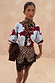 Thumbnail for Burgundy & Blue Poppy Cardigan with iconic poppy print and leopard trim, styled with a leopard lace skirt.