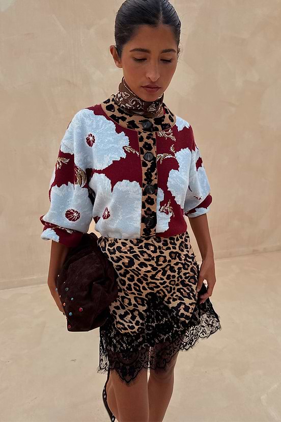 Burgundy & Blue Poppy Cardigan with leopard print trim, styled with a leopard lace skirt and brown neck scarf.