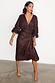 Chocolate Sequin Vienna Dress featuring a multi-wear wrap waist and puffed sleeves in a midi length.