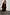 Thumbnail for Chocolate Sequin Vienna Dress with a wrap waist and long sleeves on a model in UK size 18.