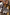 Thumbnail for Soleil Beaded Bag in chocolate and cream with a hand-embellished sun print and circular raffia and wooden handles.