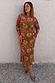 Olive Buckles Mesh Dress with western motifs and long sleeves, showcasing inclusive sizing for the NFD community.