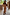 Thumbnail for Olive Buckles Mesh Dress with western horseshoe motifs and long sleeves, styled with brown boots in a mirror selfie.