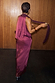Thumbnail for Burgundy Maeva Midi Skirt featuring lace detailing at the hem, shown from behind in a smooth satin-feel fabric.