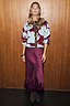 Thumbnail for Burgundy Maeva Midi Skirt in satin with an intricate lace hem, styled with a patterned cardigan and leopard trim.