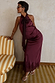 Thumbnail for Burgundy Maeva Midi Skirt in satin with a lace trim hem, styled with a matching bow halter top and silver sandals.