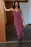 Thumbnail for Burgundy Polka Dot Mesh Dress with a pink dot print and thin cami straps, styled with brown boots.