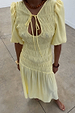 Butter Yellow Nara Dress featuring a multi-wear tie neck, shirred bodice and short puff sleeves.