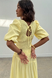 Butter Yellow Nara Dress featuring a shirred back, keyhole tie detail and puffed sleeves.