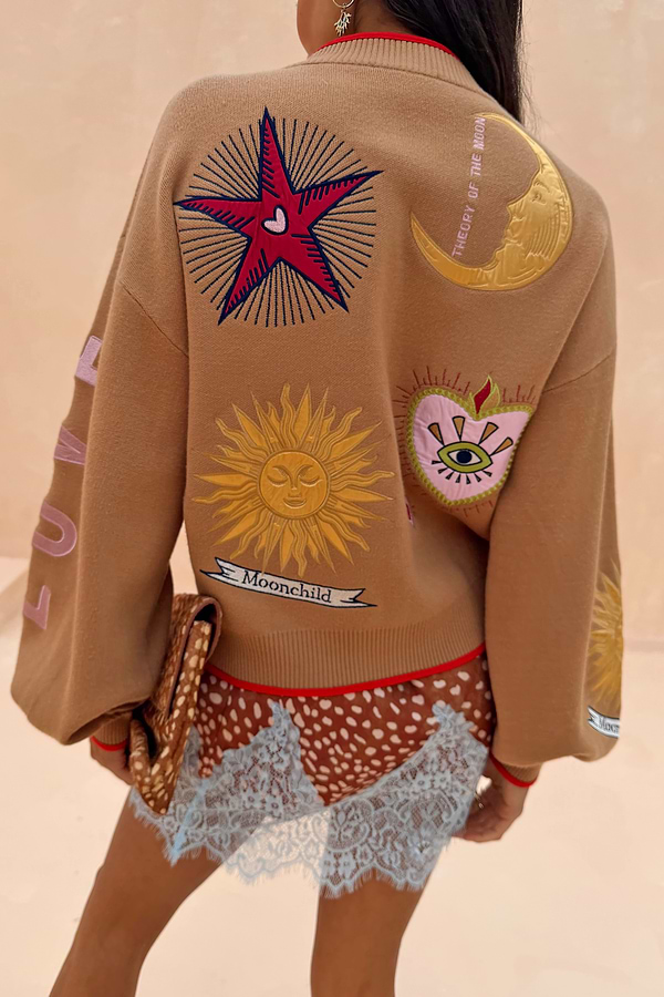 Camel Mystical Cardigan featuring embroidered sun and moon motifs on the back.